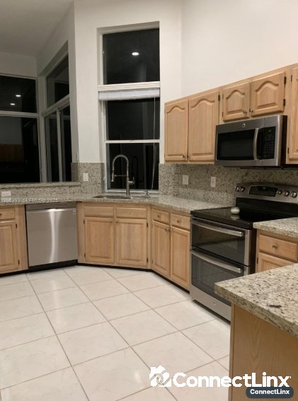 Photo 3 of 5 bed single family home in Weston
